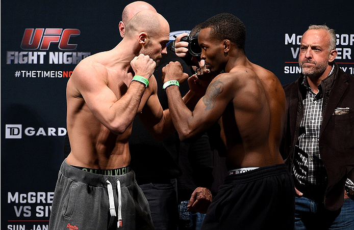 BOSTON, MA - JANUARY 17: Cathal Pendred of Ireland (L) and Sean Spencer face off during the UFC Fight Night Boston weigh-in event at the Orpheum Theatre on January 17, 2015 in Boston, Massachusetts. (Photo by Jeff Bottari/Zuffa LLC/Zuffa LLC via Getty Im