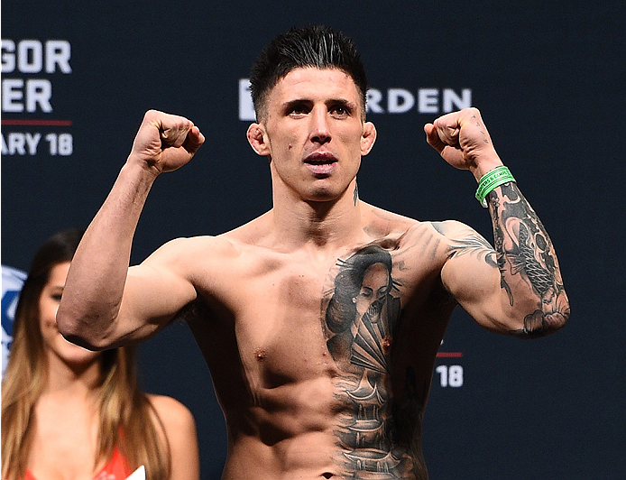 BOSTON, MA - JANUARY 17:  Norman Parke of Ireland steps on the scale during the UFC Fight Night Boston weigh-in event at the Orpheum Theatre on January 17, 2015 in Boston, Massachusetts. (Photo by Jeff Bottari/Zuffa LLC/Zuffa LLC via Getty Images)