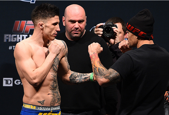 BOSTON, MA - JANUARY 17: UFC lightweight Norman Parke of Ireland (L) and Gleison Tibau of Brazil face off during the UFC Fight Night Boston weigh-in event at the Orpheum Theatre on January 17, 2015 in Boston, Massachusetts. (Photo by Jeff Bottari/Zuffa L