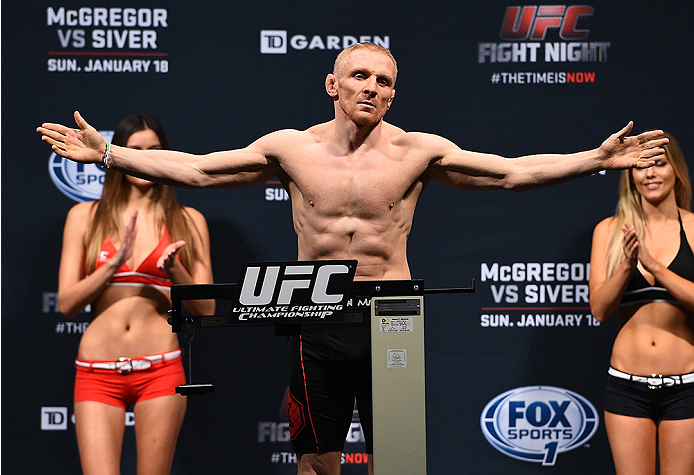 BOSTON, MA - JANUARY 17:  Dennis Siver of Germany steps on the scale during the UFC Fight Night Boston weigh-in event at the Orpheum Theatre on January 17, 2015 in Boston, Massachusetts. (Photo by Jeff Bottari/Zuffa LLC/Zuffa LLC via Getty Images)