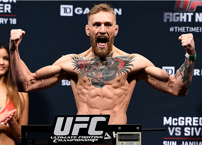 BOSTON, MA - JANUARY 17: Conor 'The Notorious' McGregor of Ireland steps on the scale during the UFC Fight Night Boston weigh-in event at the Orpheum Theatre on January 17, 2015 in Boston, Massachusetts. (Photo by Jeff Bottari/Zuffa LLC/Zuffa LLC via Get