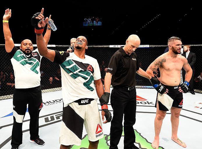 BRISBANE, AUSTRALIA - MARCH 20:   (L-R) Alan Patrick of Brazil celebrates after defeating Damien Brown of Australia by unanimous decision in their lightweight bout during the UFC Fight Night event at the Brisbane Entertainment Centre on March 20, 2016 in 