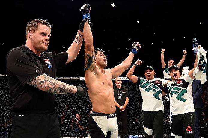 BRISBANE, AUSTRALIA - MARCH 20:   Viscardi Andrade of Brazil celebrates after defeating Rich Walsh of Australia in their welterweight bout during the UFC Fight Night event at the Brisbane Entertainment Centre on March 20, 2016 in Brisbane, Australia. (Pho