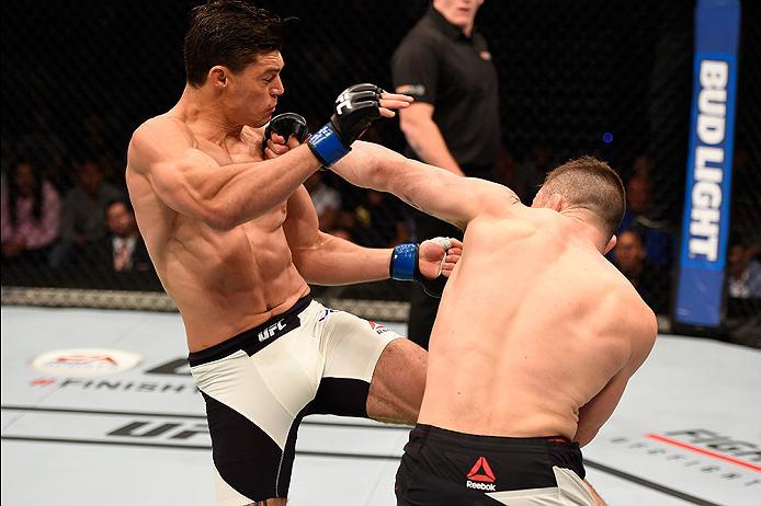 BRISBANE, AUSTRALIA - MARCH 20:   (R-L) Brendan O'Reilly of Australia punches Alan Jouban of the United States in their welterweight bout during the UFC Fight Night event at the Brisbane Entertainment Centre on March 20, 2016 in Brisbane, Australia. (Phot