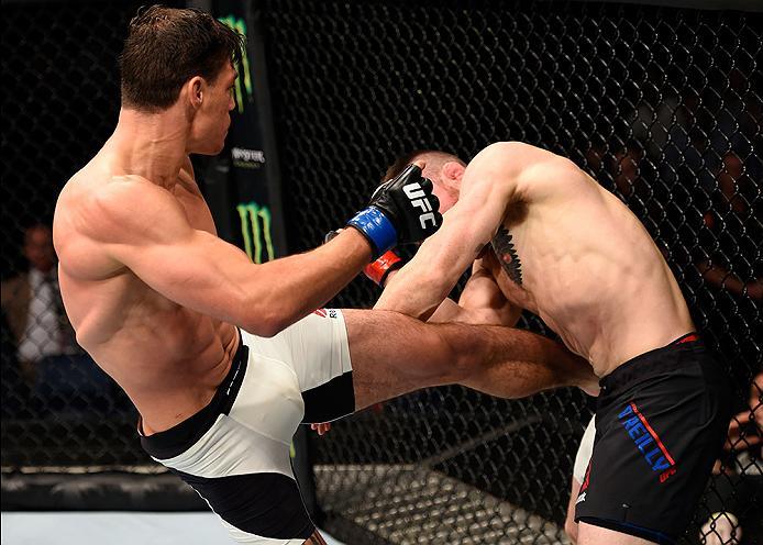 BRISBANE, AUSTRALIA - MARCH 20: (L-R) Alan Jouban of the United States kicks Brendan O'Reilly of Australia in their welterweight bout during the UFC Fight Night event at the Brisbane Entertainment Centre on March 20, 2016 in Brisbane, Australia. (Photo b