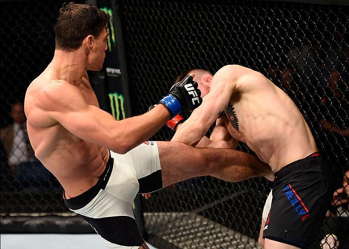 BRISBANE, AUSTRALIA - MARCH 20:  (L-R) Alan Jouban of the United States kicks Brendan O'Reilly of Australia in their welterweight bout during the UFC Fight Night event at the Brisbane Entertainment Centre on March 20, 2016 in Brisbane, Australia. (Photo b