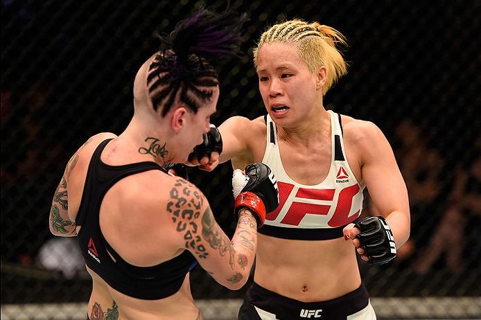 BRISBANE, AUSTRALIA - MARCH 20: (R-L) Seohee Ham of South Korea punches Bec Rawlings of Australia in their women's strawweight bout during the UFC Fight Night event at the Brisbane Entertainment Centre on March 20, 2016 in Brisbane, Australia. (Photo by