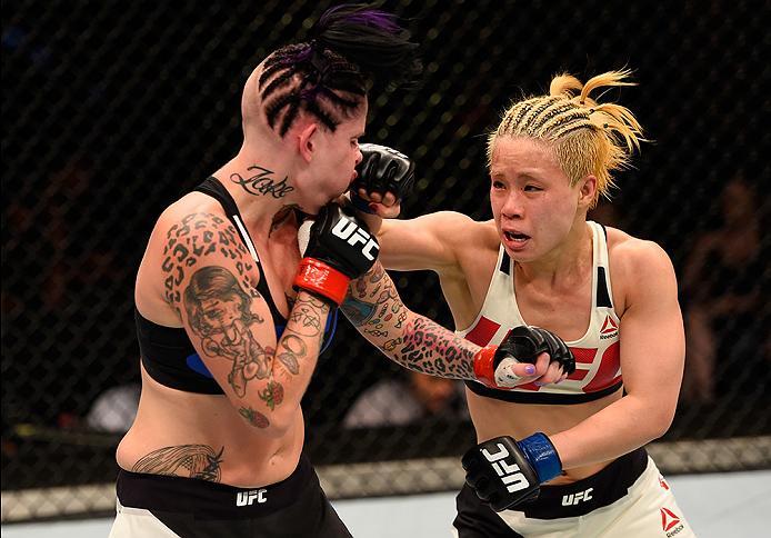BRISBANE, AUSTRALIA - MARCH 20: (R-L) Seohee Ham of South Korea punches Bec Rawlings of Australia in their women's strawweight bout during the UFC Fight Night event at the Brisbane Entertainment Centre on March 20, 2016 in Brisbane, Australia. (Photo by