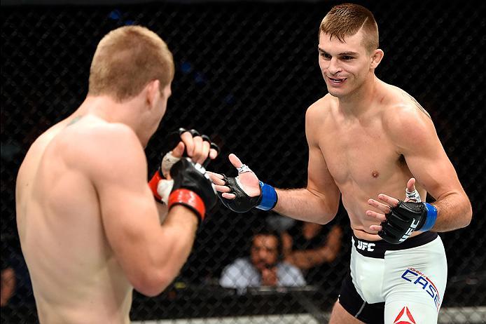 BRISBANE, AUSTRALIA - MARCH 20: (R-L) Johnny Case of the United States taunts Jake Matthews of Australia in their lightweight bout during the UFC Fight Night event at the Brisbane Entertainment Centre on March 20, 2016 in Brisbane, Australia. (Photo by J