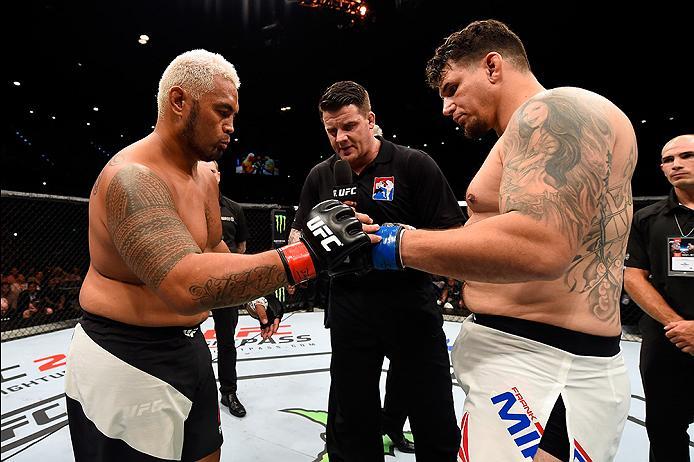 BRISBANE, AUSTRALIA - MARCH 20: (L-R) Mark Hunt of New Zealand and Frank Mir of the United States touch gloves before their heavyweight bout during the UFC Fight Night event at the Brisbane Entertainment Centre on March 20, 2016 in Brisbane, Australia. (