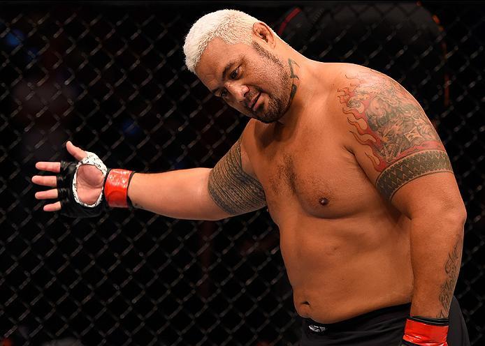 BRISBANE, AUSTRALIA - MARCH 20: Mark Hunt of New Zealand celebrates as he bows to the crowd after defeating Frank Mir of the United States in their heavyweight bout during the UFC Fight Night event at the Brisbane Entertainment Centre on March 20, 2016 i
