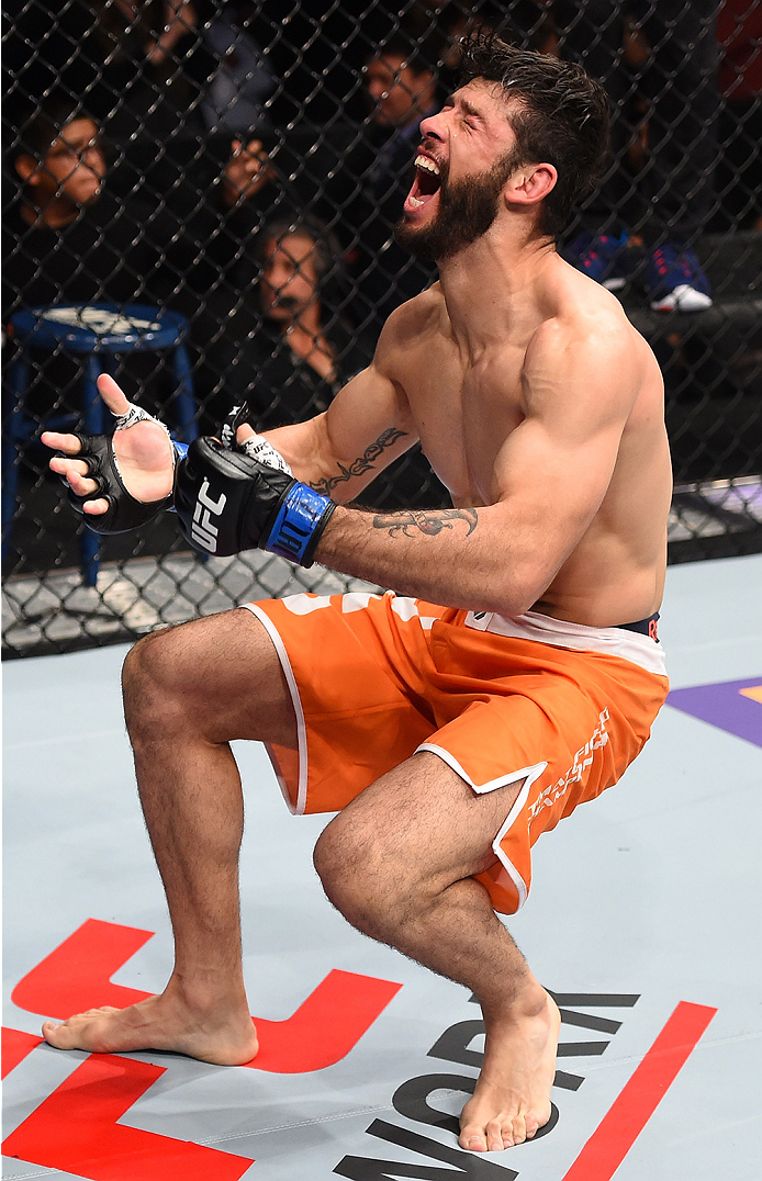 MONTERREY, MEXICO - NOVEMBER 21: Polo Reyes of Mexico celebrates after his knockout victory over Cesar Arzamendia of Paraguay in their lightweight bout during the UFC Fight Night event at Arena Monterrey on November 21, 2015 in Monterrey, Mexico. (Photo