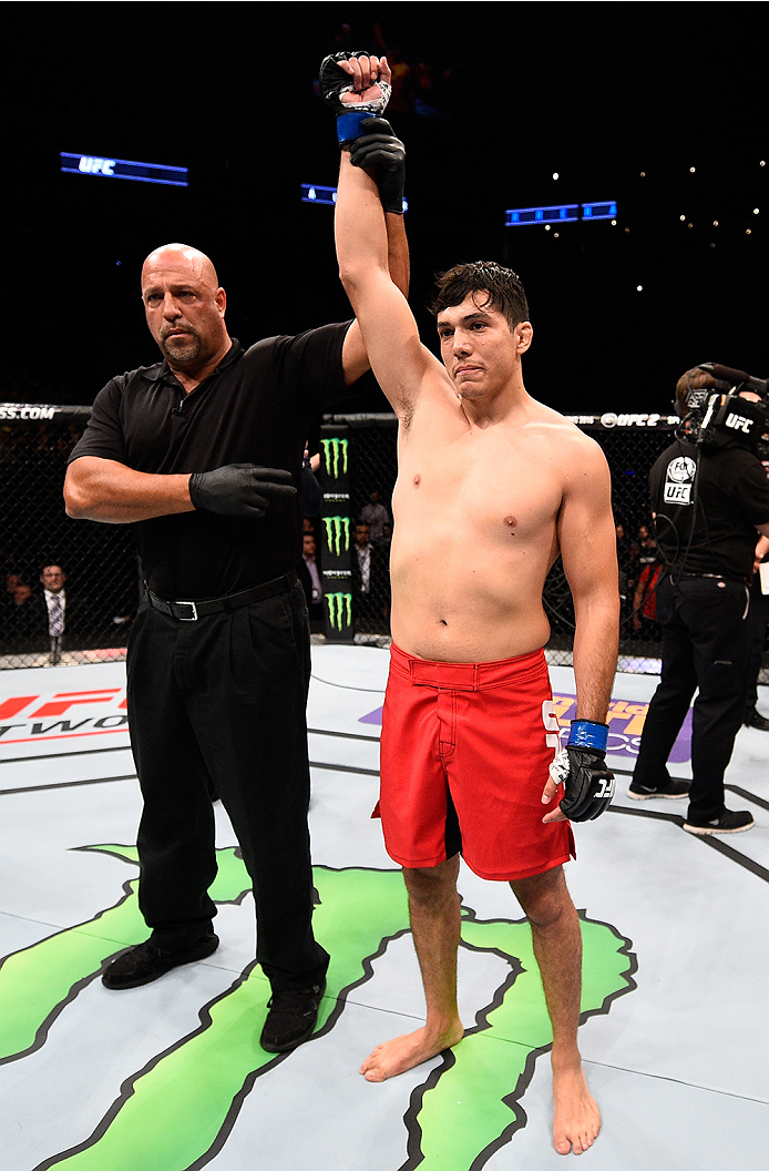 MONTERREY, MEXICO - NOVEMBER 21: Alvaro Herrera of Mexico celebrates after his knockout victory over Vernon Ramos of Panama in their welterweight bout during the UFC Fight Night event at Arena Monterrey on November 21, 2015 in Monterrey, Mexico. (Photo