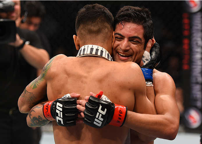 MONTERREY, MEXICO - NOVEMBER 21: (R-L) Gabriel Benitez of Mexico congratulates opponent Andre Fili of the United States after Fili's knockout victory over Benitez in their featherweight bout during the UFC Fight Night event at Arena Monterrey on November