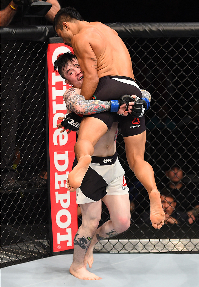 MONTERREY, MEXICO - NOVEMBER 21: (L-R) Scott Jorgensen of the United States attempts to take down Alejandro Perez of Mexico in their bantamweight bout during the UFC Fight Night event at Arena Monterrey on November 21, 2015 in Monterrey, Mexico. (Photo