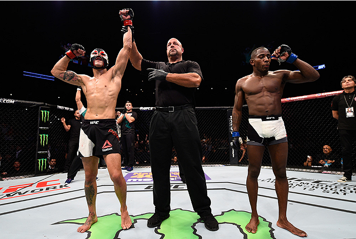 MONTERREY, MEXICO - NOVEMBER 21: Erik Perez of Mexico celebrates after his decision victory over Taylor Lapilus of France in their bantamweight bout during the UFC Fight Night event at Arena Monterrey on November 21, 2015 in Monterrey, Mexico. (Photo by