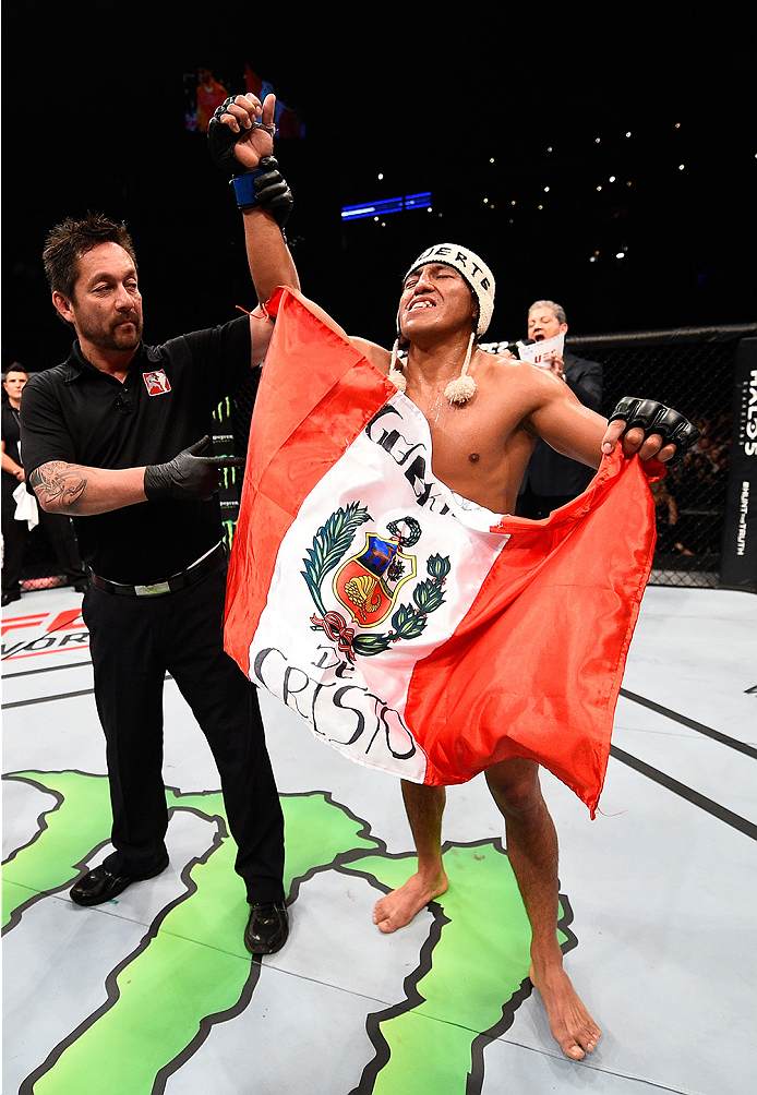 MONTERREY, MEXICO - NOVEMBER 21:  Enrique Barzola of Peru celebrates after his victory over Horacio Gutierrez during the UFC Fight Night event at Arena Monterrey on November 21, 2015 in Monterrey, Mexico.  (Photo by Jeff Bottari/Zuffa LLC/Zuffa LLC via Ge