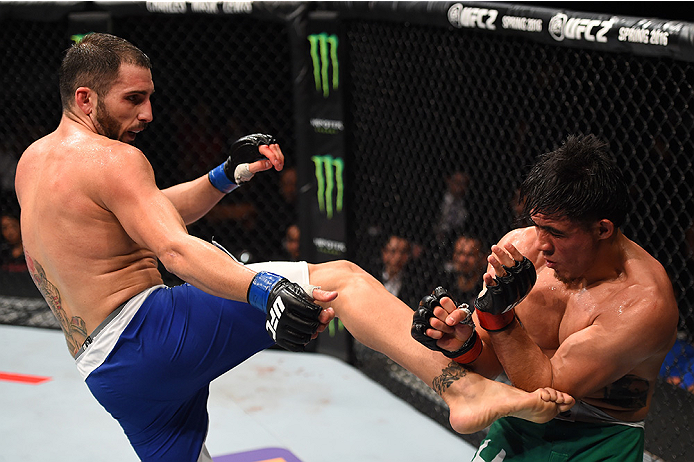 MONTERREY, MEXICO - NOVEMBER 21: (L-R) Enrique Marin of Spain kicks Erick Montano of Mexico in their welterweight bout during the UFC Fight Night event at Arena Monterrey on November 21, 2015 in Monterrey, Mexico. (Photo by Jeff Bottari/Zuffa LLC/Zuffa