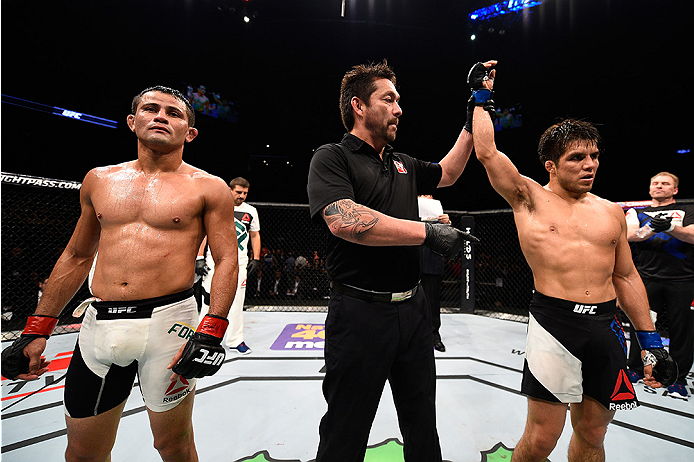 MONTERREY, MEXICO - NOVEMBER 21: Henry Cejudo of the United States celebrates after his split-decision victory over Jussier Formiga of Brazil in their flyweight bout during the UFC Fight Night event at Arena Monterrey on November 21, 2015 in Monterrey, M
