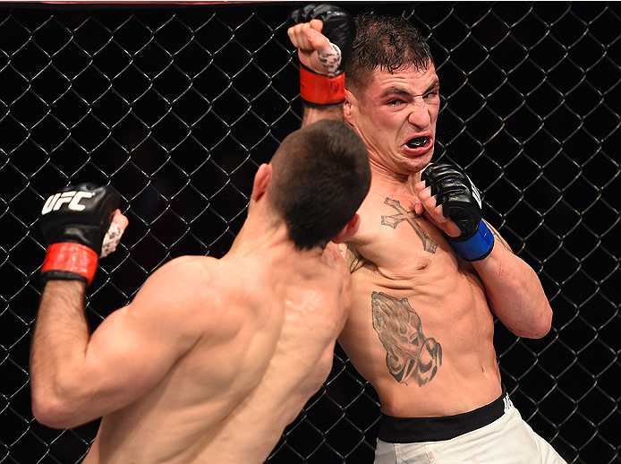 MONTERREY, MEXICO - NOVEMBER 21:  (R-L) Diego Sanchez of the United States and Ricardo Lamas of the United States trade punches in their featherweight bout during the UFC Fight Night event at Arena Monterrey on November 21, 2015 in Monterrey, Mexico.  (Ph