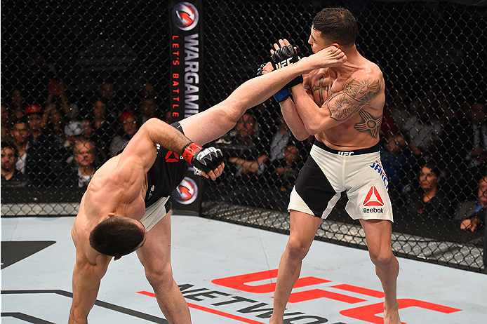 MONTERREY, MEXICO - NOVEMBER 21:  (L-R) Ricardo Lamas of the United States kicks Diego Sanchez of the United States in their featherweight bout during the UFC Fight Night event at Arena Monterrey on November 21, 2015 in Monterrey, Mexico.  (Photo by Jeff 