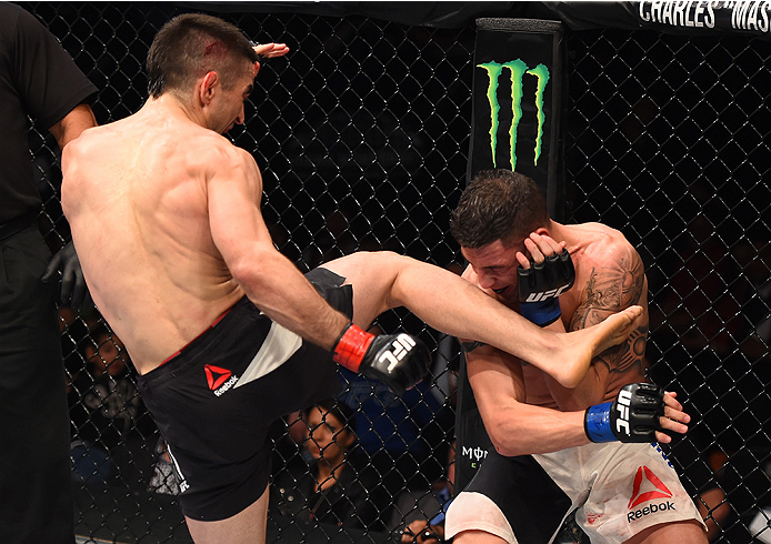 MONTERREY, MEXICO - NOVEMBER 21: (L-R) Ricardo Lamas of the United States kicks Diego Sanchez of the United States in their featherweight bout during the UFC Fight Night event at Arena Monterrey on November 21, 2015 in Monterrey, Mexico. (Photo by Jeff