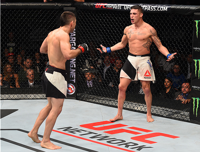 MONTERREY, MEXICO - NOVEMBER 21:  (R-L) Diego Sanchez of the United States taunts Ricardo Lamas of the United States in their featherweight bout during the UFC Fight Night event at Arena Monterrey on November 21, 2015 in Monterrey, Mexico.  (Photo by Jeff