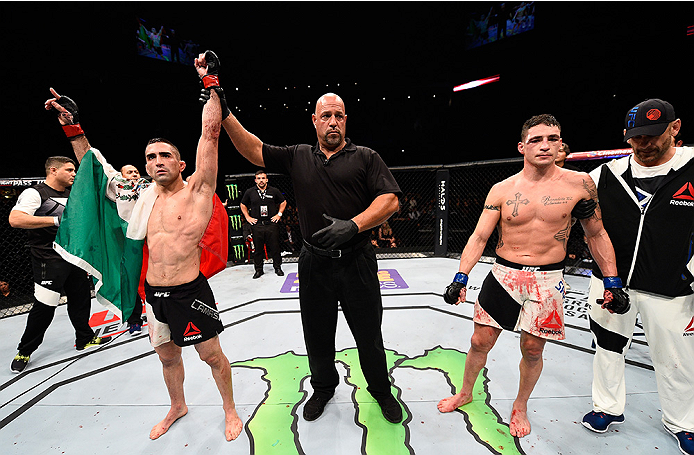 MONTERREY, MEXICO - NOVEMBER 21: Ricardo Lamas of the United States celebrates after his decision victory over Diego Sanchez of the United States in their featherweight bout during the UFC Fight Night event at Arena Monterrey on November 21, 2015 in Mont
