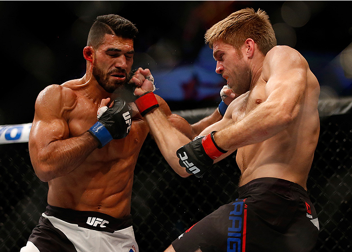 SAN DIEGO, CA - JULY 15: (R-L) Andrew Craig punches Lyman Good in their middleweight bout during the UFC event at the Valley View Casino Center on July 15, 2015 in San Diego, California. (Photo by Todd Warshaw/Zuffa LLC/Zuffa LLC via Getty Images)