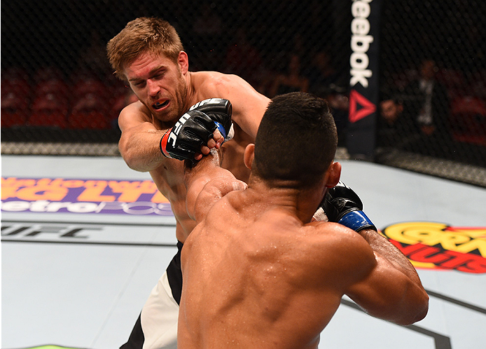 SAN DIEGO, CA - JULY 15: (R-L) Lyman Good punches Andrew Craig in their middleweight bout during the UFC event at the Valley View Casino Center on July 15, 2015 in San Diego, California. (Photo by Jeff Bottari/Zuffa LLC/Zuffa LLC via Getty Images)