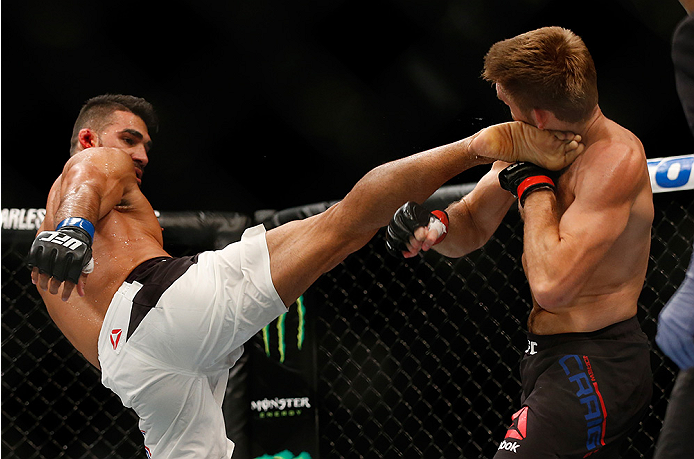 SAN DIEGO, CA - JULY 15:   (L-R) Lyman Good kicks Andrew Craig in their middleweight bout during the UFC event at the Valley View Casino Center on July 15, 2015 in San Diego, California. (Photo by Todd Warshaw/Zuffa LLC/Zuffa LLC via Getty Images)