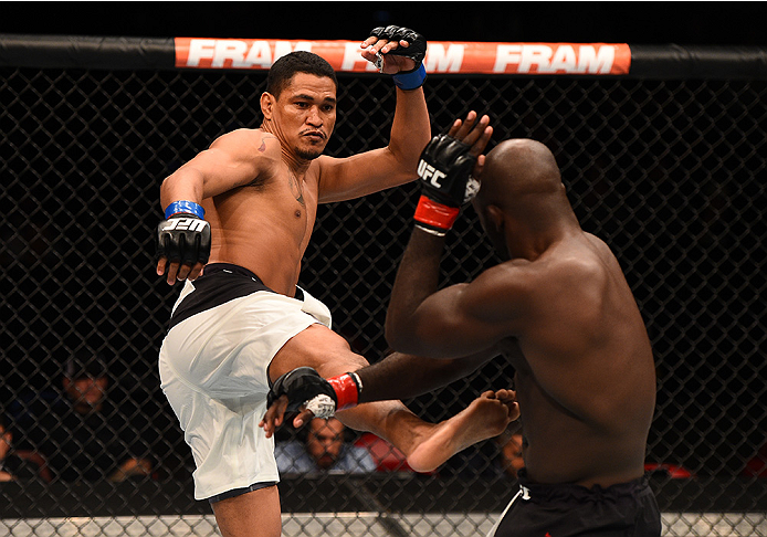 SAN DIEGO, CA - JULY 15:   (L-R) Ildemar Alcantara of Brazil kicks Kevin Casey in their middleweight bout during the UFC event at the Valley View Casino Center on July 15, 2015 in San Diego, California. (Photo by Jeff Bottari/Zuffa LLC/Zuffa LLC via Getty