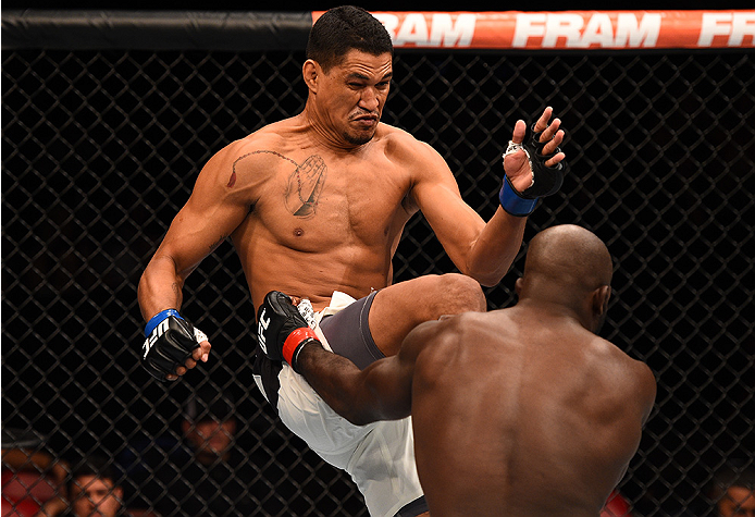 SAN DIEGO, CA - JULY 15:   (L-R) Ildemar Alcantara of Brazil knees Kevin Casey in their middleweight bout during the UFC event at the Valley View Casino Center on July 15, 2015 in San Diego, California. (Photo by Jeff Bottari/Zuffa LLC/Zuffa LLC via Getty