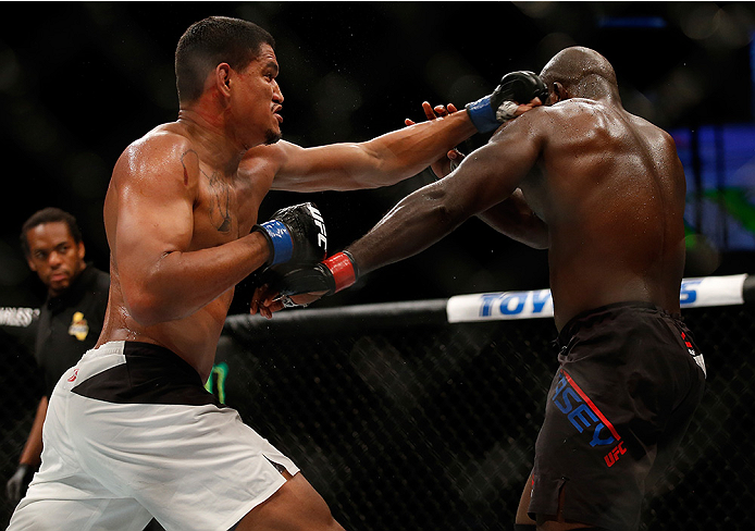 SAN DIEGO, CA - JULY 15:   (L-R) Ildemar Alcantara of Brazil punches Kevin Casey in their middleweight bout during the UFC event at the Valley View Casino Center on July 15, 2015 in San Diego, California. (Photo by Todd Warshaw/Zuffa LLC/Zuffa LLC via Get