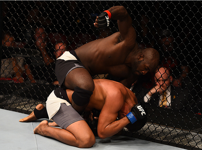 SAN DIEGO, CA - JULY 15:  Kevin Casey (top) punches Ildemar Alcantara of Brazil in their middleweight bout during the UFC event at the Valley View Casino Center on July 15, 2015 in San Diego, California. (Photo by Jeff Bottari/Zuffa LLC/Zuffa LLC via Gett