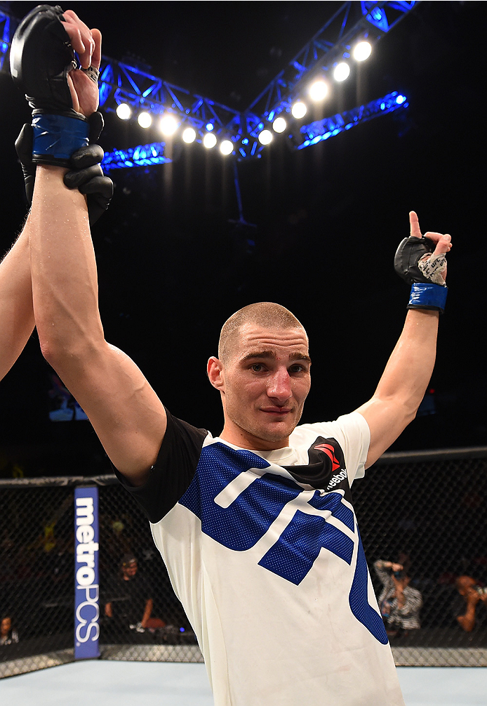 SAN DIEGO, CA - JULY 15:   Sean Strickland celebrates his victory over Igor Araujo of Brazil in their welterweight bout during the UFC event at the Valley View Casino Center on July 15, 2015 in San Diego, California. (Photo by Jeff Bottari/Zuffa LLC/Zuffa