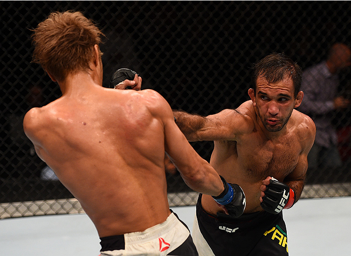 SAN DIEGO, CA - JULY 15: (R-L) Rani Yahya of Brazil punches Masanori Kanehara of Japan in their bantamweight bout during the UFC event at the Valley View Casino Center on July 15, 2015 in San Diego, California. (Photo by Jeff Bottari/Zuffa LLC/Zuffa LLC
