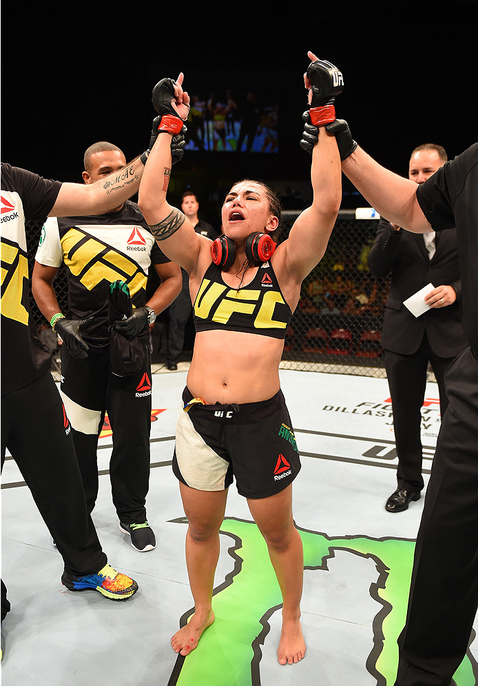 SAN DIEGO, CA - JULY 15:   Jessica Andrade of Brazil celebrates her victory over Sarah Moras of Canada in their women's bantamweight bout during the UFC event at the Valley View Casino Center on July 15, 2015 in San Diego, California. (Photo by Jeff Botta