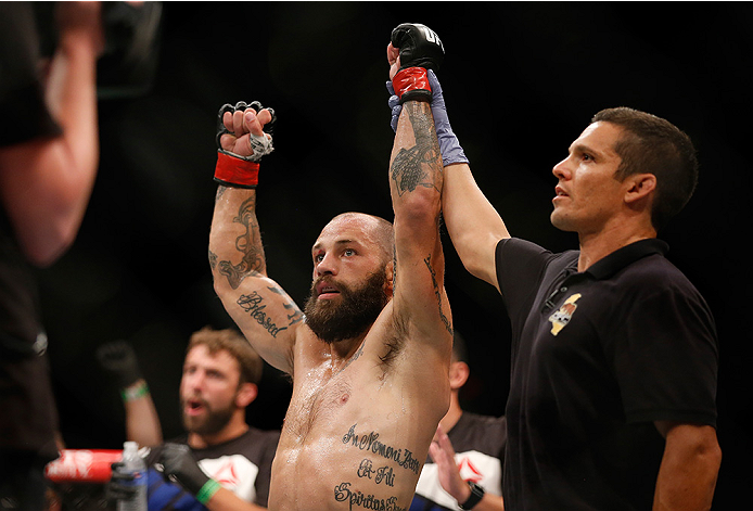 SAN DIEGO, CA - JULY 15:   Sam Sicilia celebrates his victory over Yaotzin Meza in their featherweight bout during the UFC event at the Valley View Casino Center on July 15, 2015 in San Diego, California.  (Photo by Todd Warshaw/Zuffa LLC/Zuffa LLC via Ge