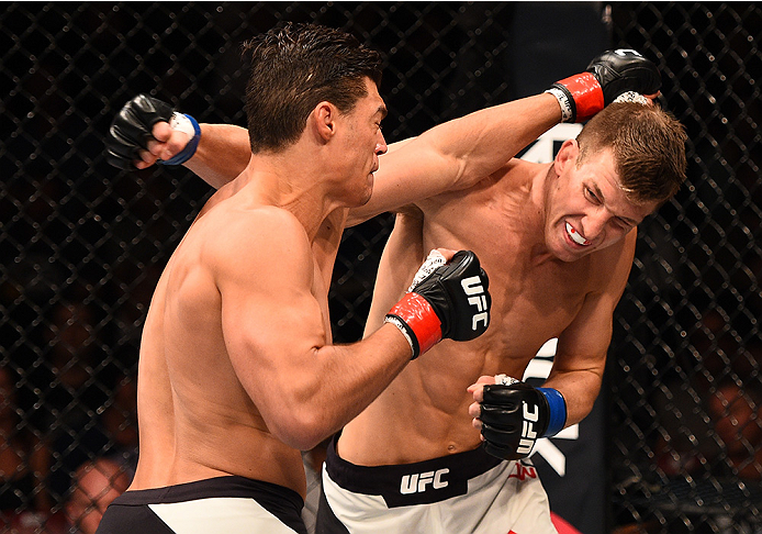 SAN DIEGO, CA - JULY 15:   (L-R) Alan Jouban punches Matt Dwyer of Canada in their welterweight bout during the UFC event at the Valley View Casino Center on July 15, 2015 in San Diego, California. (Photo by Jeff Bottari/Zuffa LLC/Zuffa LLC via Getty Imag