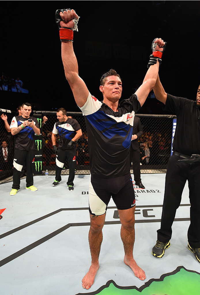 SAN DIEGO, CA - JULY 15:   Alan Jouban celebrates his victory over Matt Dwyer of Canada in their welterweight bout during the UFC event at the Valley View Casino Center on July 15, 2015 in San Diego, California. (Photo by Jeff Bottari/Zuffa LLC/Zuffa LLC 