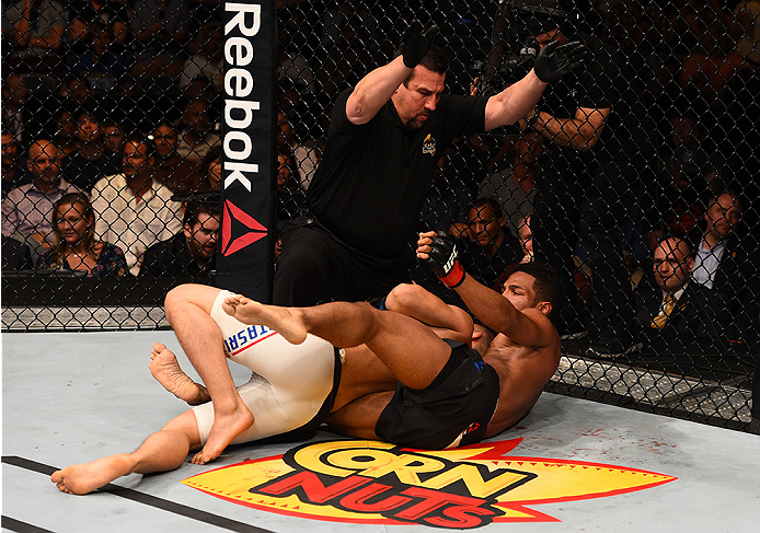 SAN DIEGO, CA - JULY 15: (R-L) Kevin Lee submits James Moontasri in their lightweight bout during the UFC event at the Valley View Casino Center on July 15, 2015 in San Diego, California. (Photo by Jeff Bottari/Zuffa LLC/Zuffa LLC via Getty Images)