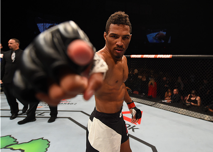 SAN DIEGO, CA - JULY 15:  Kevin Lee celebrates his submission victory over James Moontasri in their lightweight bout during the UFC event at the Valley View Casino Center on July 15, 2015 in San Diego, California. (Photo by Jeff Bottari/Zuffa LLC/Zuffa LL