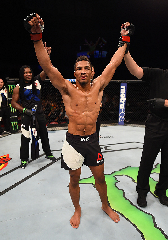 SAN DIEGO, CA - JULY 15:  Kevin Lee celebrates his submission victory over James Moontasri in their lightweight bout during the UFC event at the Valley View Casino Center on July 15, 2015 in San Diego, California. (Photo by Jeff Bottari/Zuffa LLC/Zuffa LL