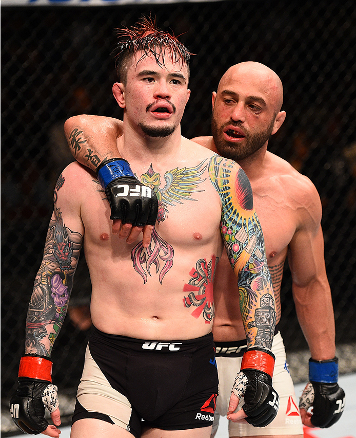 SAN DIEGO, CA - JULY 15: (R-L) Manny Gamburyan and Scott Jorgensen embrace after their flyweight bout during the UFC event at the Valley View Casino Center on July 15, 2015 in San Diego, California. (Photo by Jeff Bottari/Zuffa LLC/Zuffa LLC via Getty I