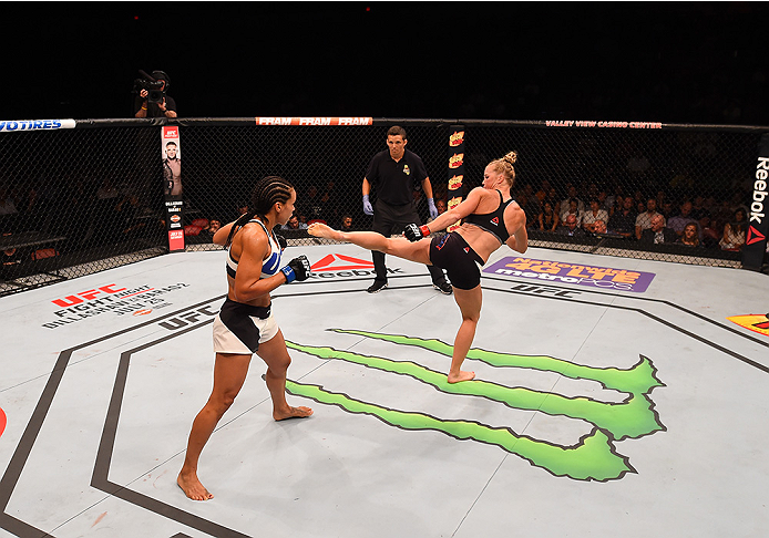 SAN DIEGO, CA - JULY 15: (R-L) Holly Holm kicks Marion Reneau in their women's bantamweight bout during the UFC event at the Valley View Casino Center on July 15, 2015 in San Diego, California. (Photo by Jeff Bottari/Zuffa LLC/Zuffa LLC via Getty Images