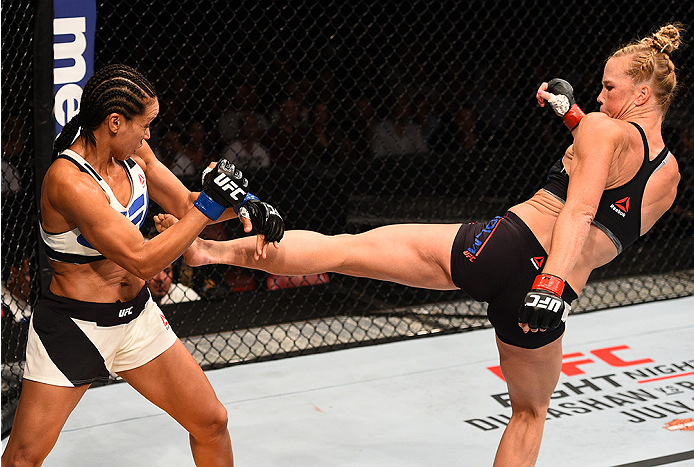 SAN DIEGO, CA - JULY 15:   (R-L) Holly Holm kicks Marion Reneau in their women's bantamweight bout during the UFC event at the Valley View Casino Center on July 15, 2015 in San Diego, California. (Photo by Jeff Bottari/Zuffa LLC/Zuffa LLC via Getty Images