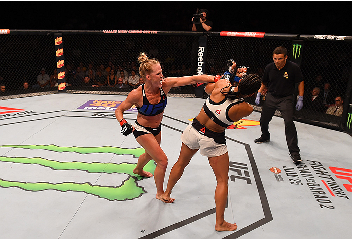 SAN DIEGO, CA - JULY 15:   (L-R) Holly Holm punches Marion Reneau in their women's bantamweight bout during the UFC event at the Valley View Casino Center on July 15, 2015 in San Diego, California. (Photo by Jeff Bottari/Zuffa LLC/Zuffa LLC via Getty Imag