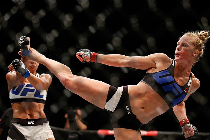 SAN DIEGO, CA - JULY 15:   (R-L) Holly Holm kicks Marion Reneau in their women's bantamweight bout during the UFC event at the Valley View Casino Center on July 15, 2015 in San Diego, California. (Photo by Todd Warshaw/Zuffa LLC/Zuffa LLC via Getty Images