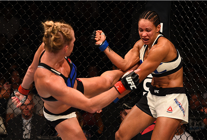 SAN DIEGO, CA - JULY 15: (L-R) Holly Holm kicks Marion Reneau in their women's bantamweight bout during the UFC event at the Valley View Casino Center on July 15, 2015 in San Diego, California. (Photo by Jeff Bottari/Zuffa LLC/Zuffa LLC via Getty Images